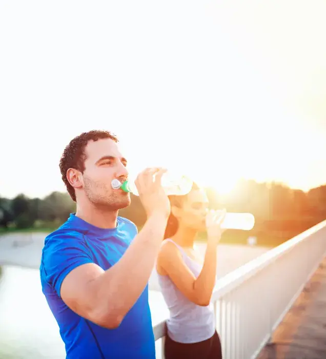 man and woman drinking who are a part of the ketogenic diet method 