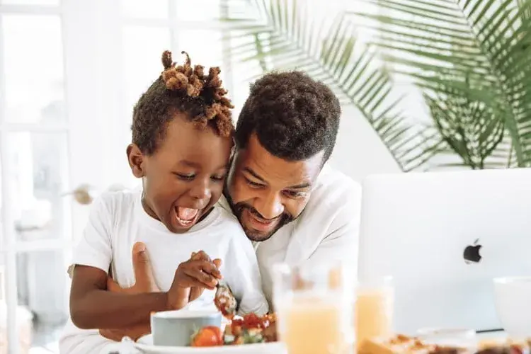 Father and son happy after the family took part in a great diet for fertility and weight loss Father and son happy after the family took part in a great diet for fertility and weight loss